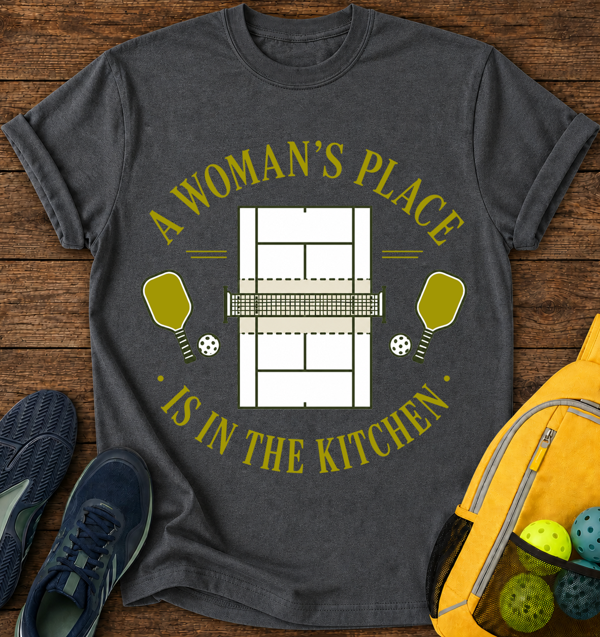 A Woman's Place is in The Kitchen - T-Shirt