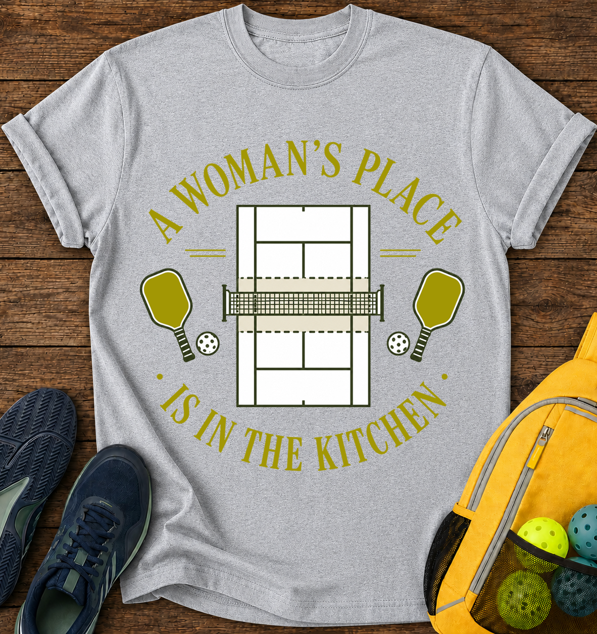 A Woman's Place is in The Kitchen - T-Shirt